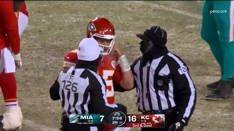 Patrick Mahomes cracks helmet during Dolphins-Chiefs playoff clash as ex-ref questions officials ...