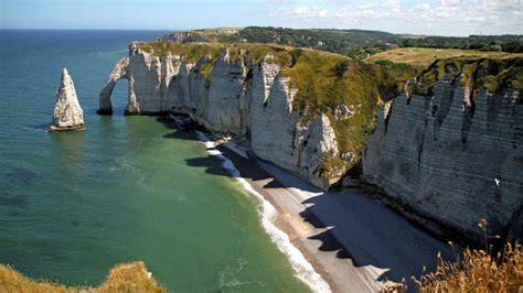 See the White Chalk Cliffs and Arches at Etretat in Normandy