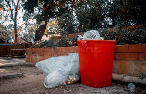 Red Trash and Trash Bags in Park Stock Photo - Image of flat, disease ...