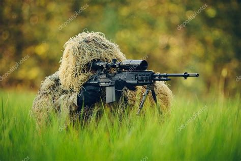 Sniper in camouflage suit looking at the target Stock Photo by ...