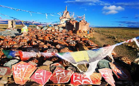 Mani Stone Piles in Tibet – Tibet Train Blog