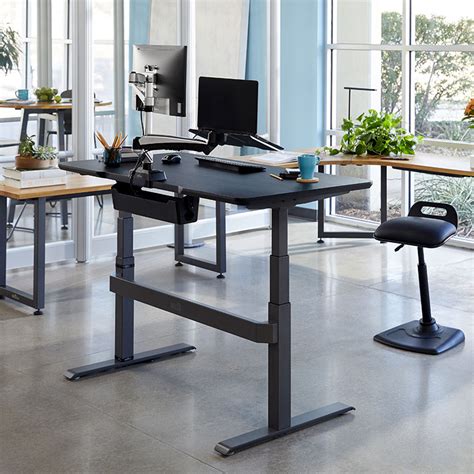 Electric Standing Desk 60x30 | Sit-to-Stand Adjustable Desk | Vari® | Adjustable height standing ...