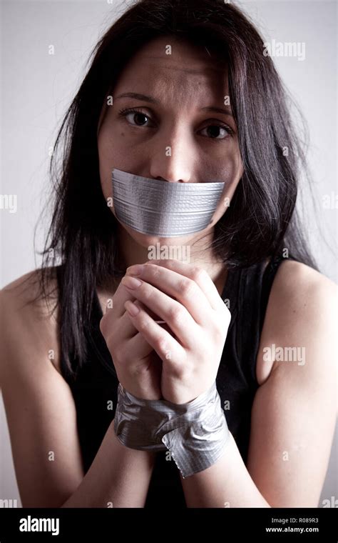 kidnapped young woman, hostage closeup on white background Stock Photo ...