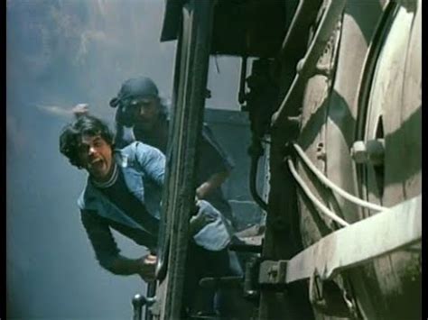 Sholay - Train attack scene (Original sound track) - YouTube