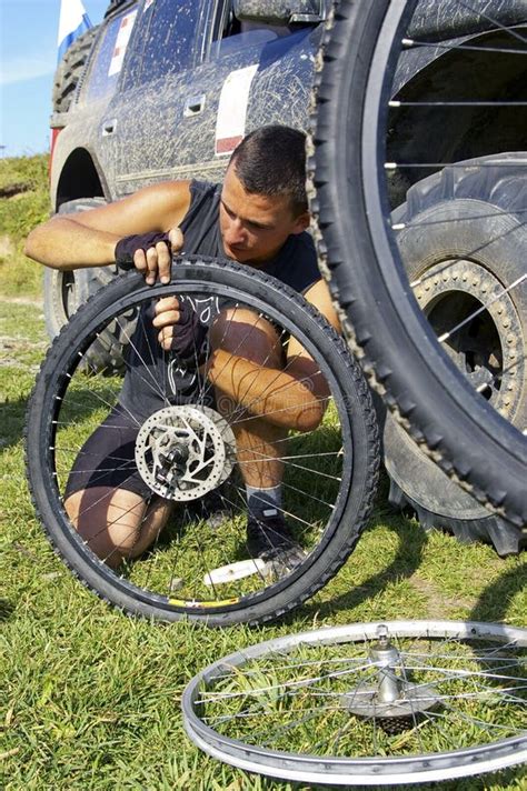 Repair bicycle wheel stock image. Image of bicycle, gloves - 16987123