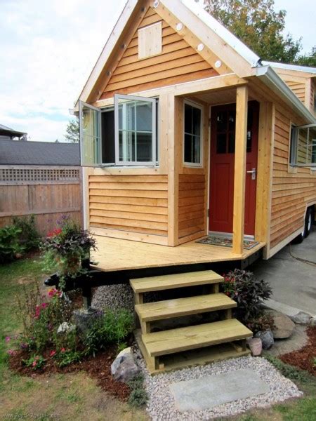 Tiny House with Porch over Hitch of Trailer - Tiny House Pins