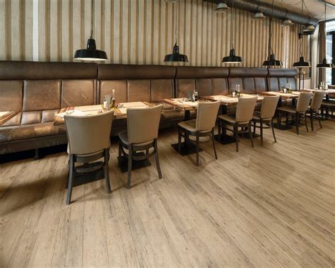 Expona Bevel Line luxury vinyl tiles in Boardwalk Variety Oak, restaurant | Wood effect tiles ...