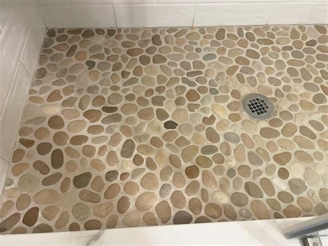 How to Grout Natural Stone Pebble Shower Floors | Remodeling