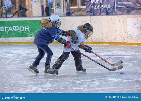 Children with Hockey Sticks Playing Hockey at the Festival Editorial ...