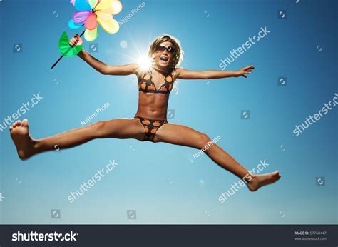 Happy Little Girl Jumping Stock Photo 57760447 | Shutterstock