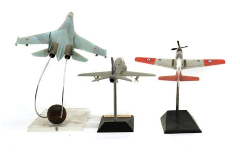 Sold Price: Three model Military aircraft on display stands - August 2 ...