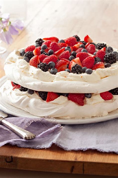 Layered Berry Pavlova – Layers of sweetened cream cheese and mixed berries—including ...