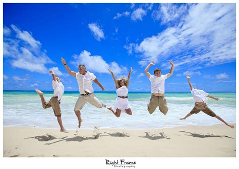 Oahu family portrait on the beach by RIGHT FRAME PHOTOGRAPHY