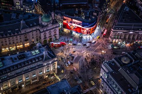 Neon city: aerial photos of London at night | London photos, Visit ...