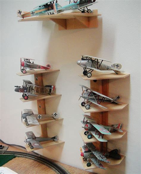 special shelving designed to hold model airplanes! | Decoración de aviación, Decoracion de muros ...