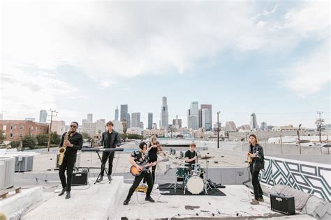 Music Band Playing on the Rooftop · Free Stock Photo