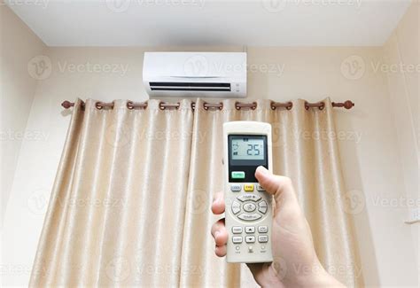 Air conditioner with remote controller. 11830504 Stock Photo at Vecteezy