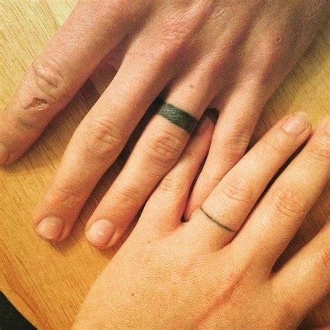 50 Cool Wedding Ring Tattoos To Express Their Undying Love » EcstasyCoffee