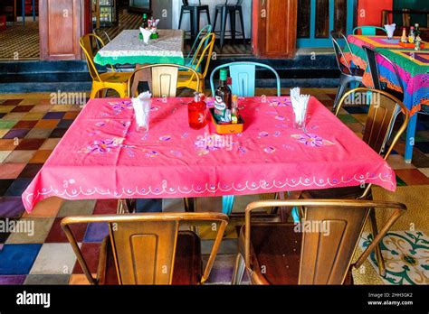 Rustic restaurant tables in private business in Sao Paulo, Brazil Stock Photo - Alamy