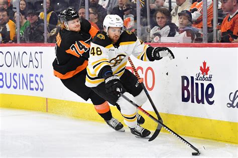 Bruins clip Flyers for NHL-record 63rd win | Reuters