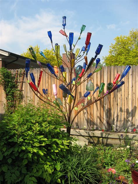 The history of bottle trees is pretty interesting. | Very Cool | Pinterest | Bottle trees ...