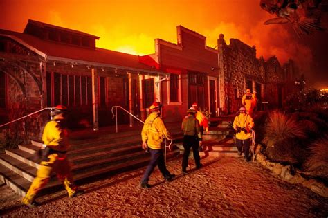 California wildfires force 180,000 to evacuate as ‘historic' winds send ...