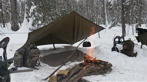 Setting up a tarp in snow (With images) | Outdoor survival, Bushcraft ...