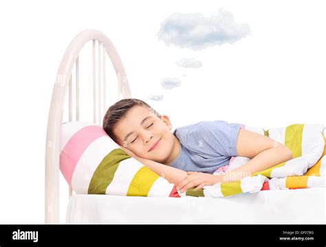 Happy boy sleeping and dreaming sweet dreams with a cloud above his ...