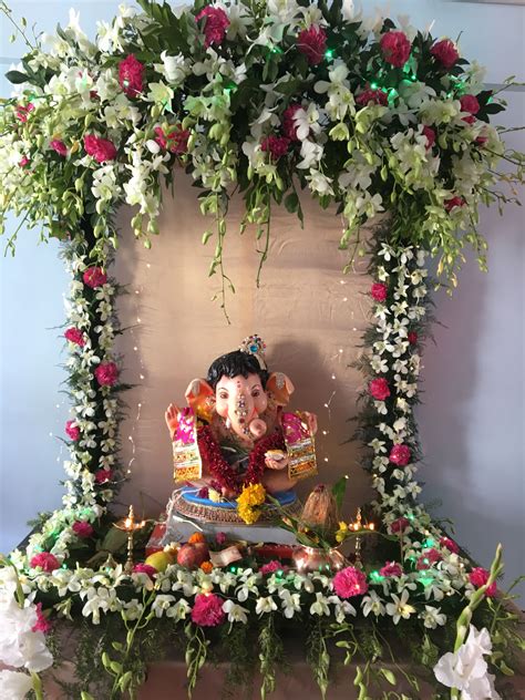 Outstanding Mandir Decoration With Artificial Flowers Orchid Faux ...