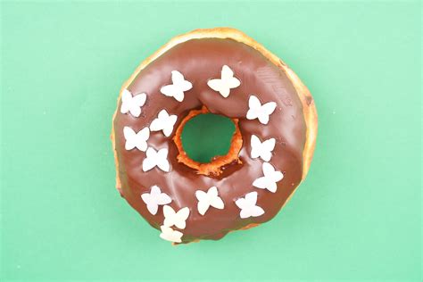 Delicious donut on green - Template Catalog