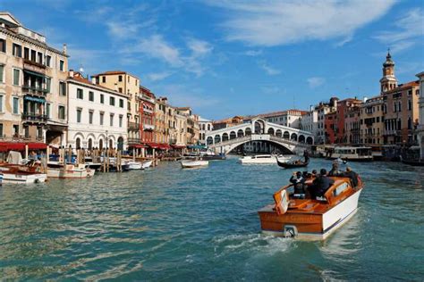 Venice: Grand Canal Guided Tour on an Elegant Boat | GetYourGuide