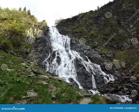 Waterfall near Balea Lac stock photo. Image of mountains - 61990208