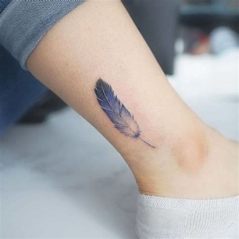 50 Beautiful Feather Tattoo Designs | TattooAdore | Feather tattoo ...