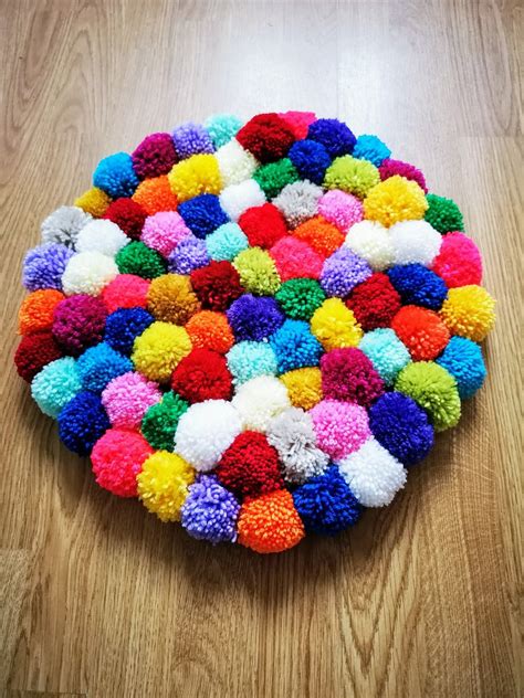 Handmade pom pom rug | Pom pom rug, Handcraft, Pom pom