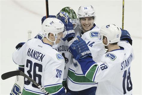 NHL schedule 2014: Canucks knock off Ducks in OT, Oilers upset Rangers ...