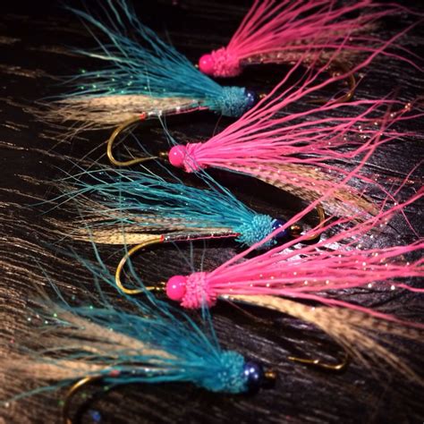 Some rolled muddlers fresh off the #norvise for chasing sea run cutthroat trout. Steelhead ...