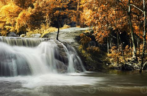 Waterfall with blue stream 1321480 Stock Photo at Vecteezy