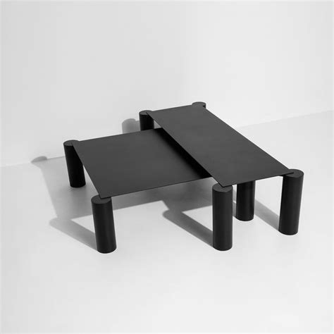 Max Enrich creates nesting coffee tables with bulky legs and slender tops | Coffee table square ...