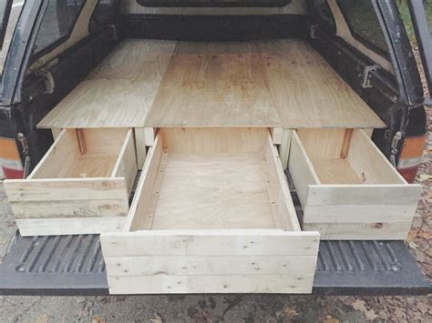 DIY truck bed camper! Made completely from reclaimed wood and screws ...