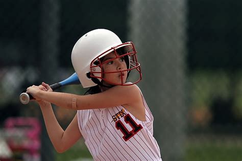 Royalty-Free photo: Close-up photography of girl holding baseball bat | PickPik