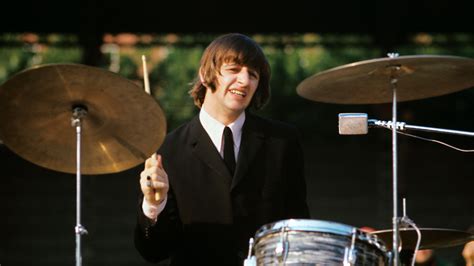 Ringo Starr playing drums during the concert of British band The ...