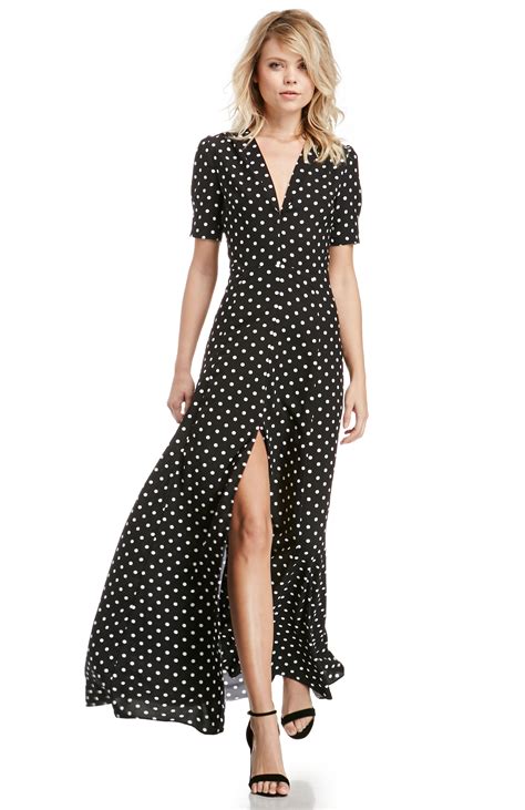 DAILYLOOK Sultry Polka Dot Maxi Dress in Black/White | DAILYLOOK