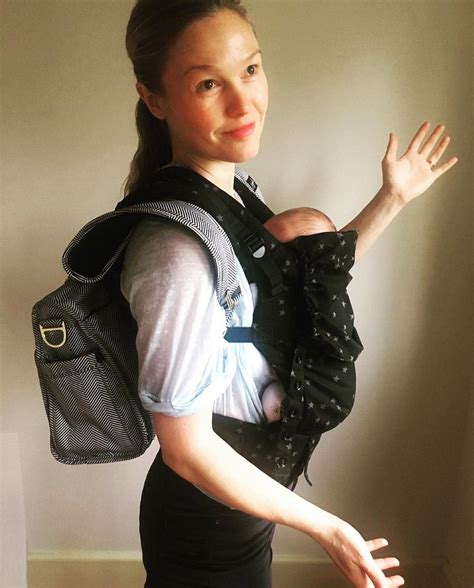 Julia Stiles Shows Off Newborn Son Strummer in Tula Carrier