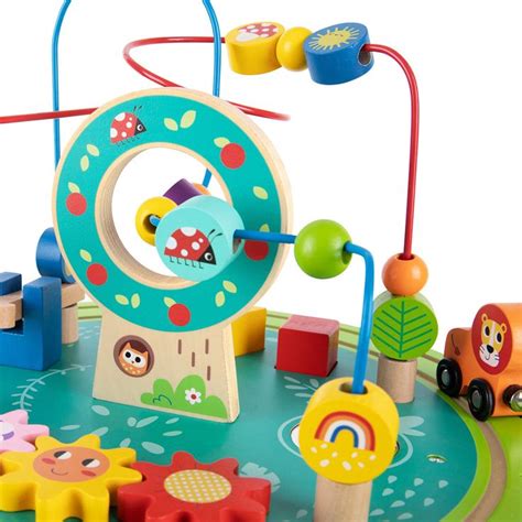 a colorful wooden toy set with animals and cars