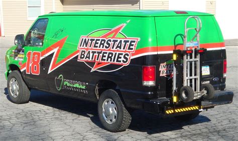 Interstate Batteries Ford commercial cargo van with HTS Systems' HTS-20SFE swing mount hand ...