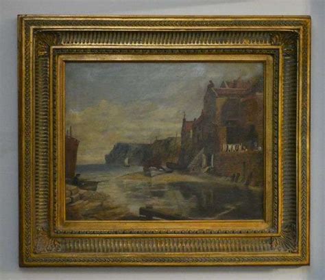 Framed painting on canvas of a seaside village scene; 25-033 - R.H. Lee & Co. Auctioneers