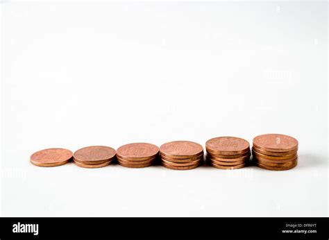 A stack of ascending pennies Stock Photo - Alamy