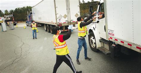 Pressure mounts on B.C. truckers as U.S. border vaccine mandate looms - Richmond News