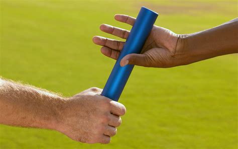 BXP135677 | Hands Passing Baton at Sporting Event | tableatny | Flickr