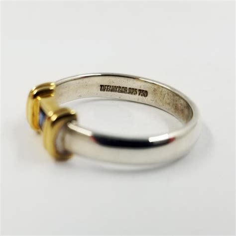 Tiffany and Co. Sterling Silver and 18 Karat Yellow Gold Sapphire Solitaire Band at 1stDibs